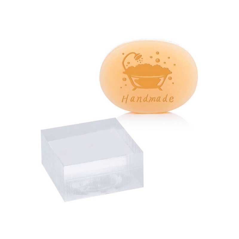 Clear acrylic soap stamp without handle. The stamp is used to stamp a pattern into already cut soap.
Press the stamp into freshly cut soap (not fully aged) and