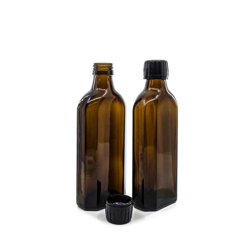 Theglass bottle is made of thick, dark brown glass with avolume of 250 ml. It is used for storing liquids, which thanks to its colour it effectively protects fr