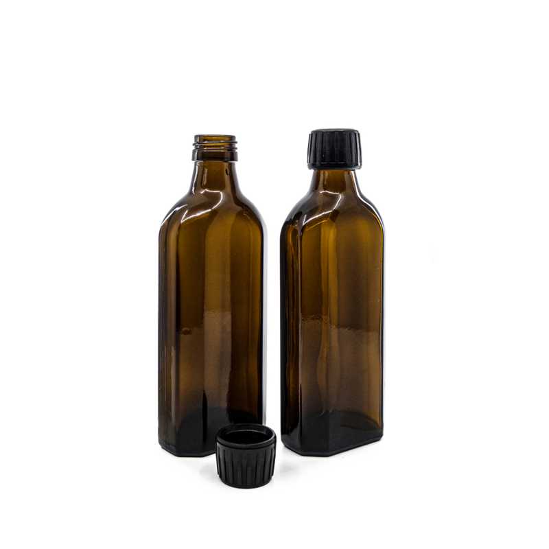 Theglass bottle is made of thick, dark brown glass with avolume of 250 ml. It is used for storing liquids, which thanks to its colour it effectively protects fr